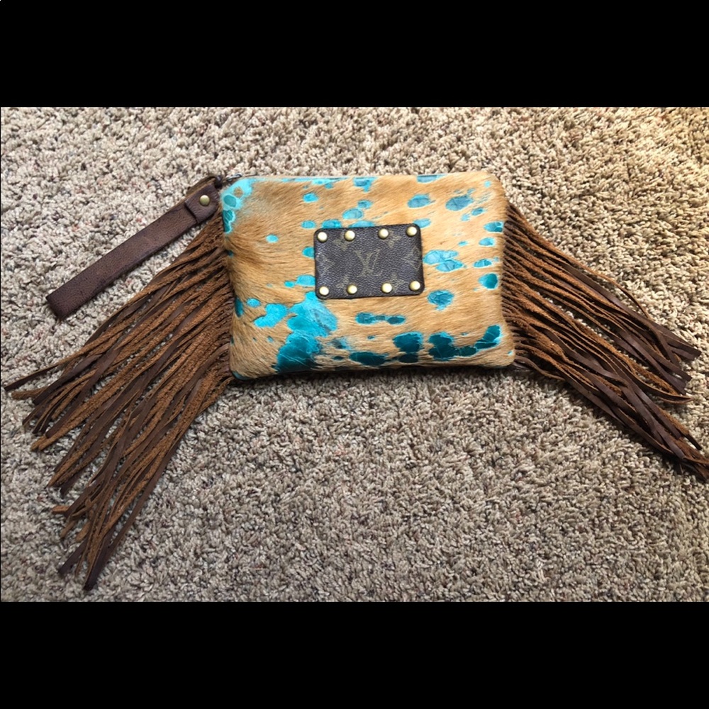 Cowhide fringe wristlet
